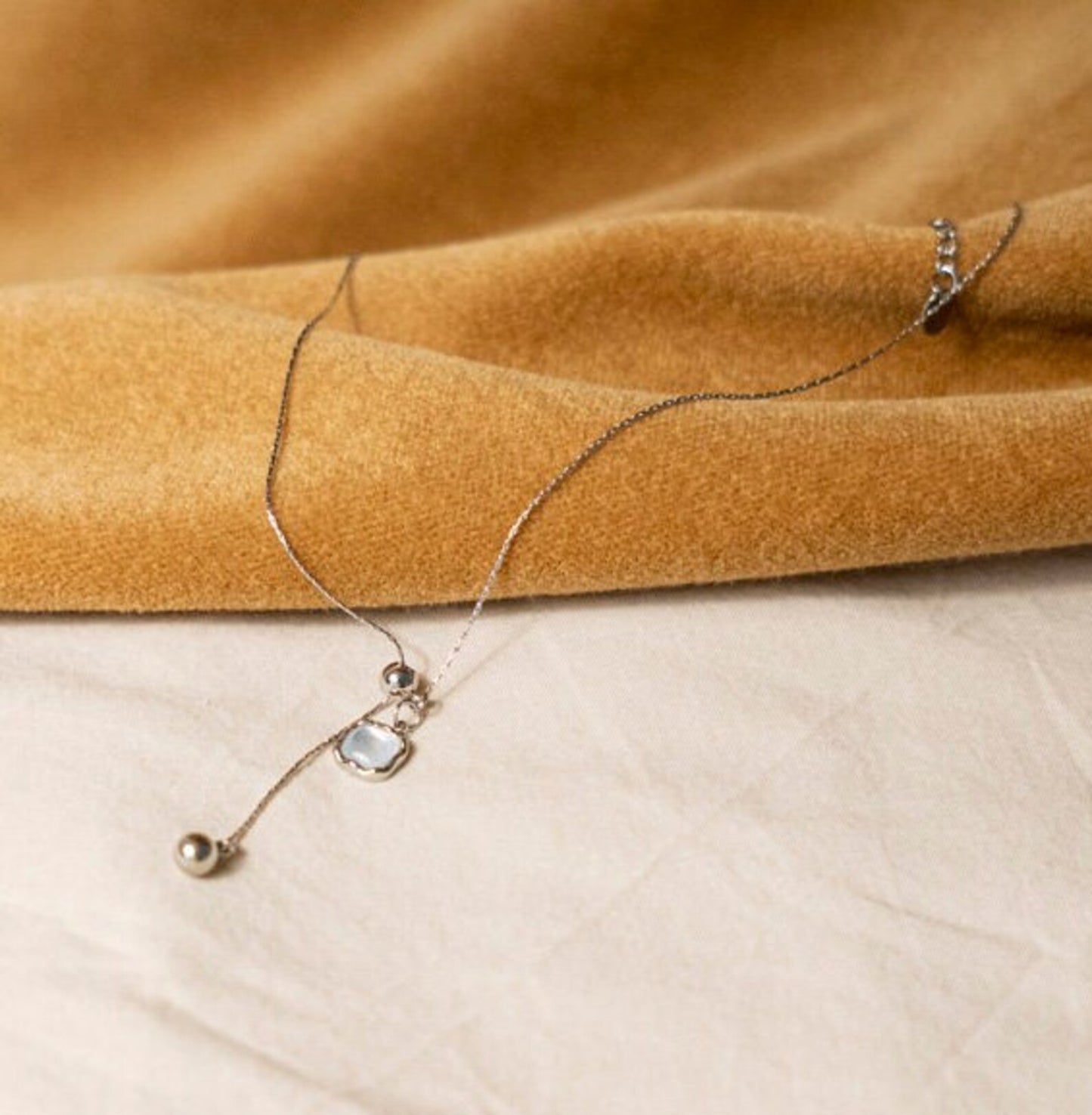 Light blue pendant necklace
