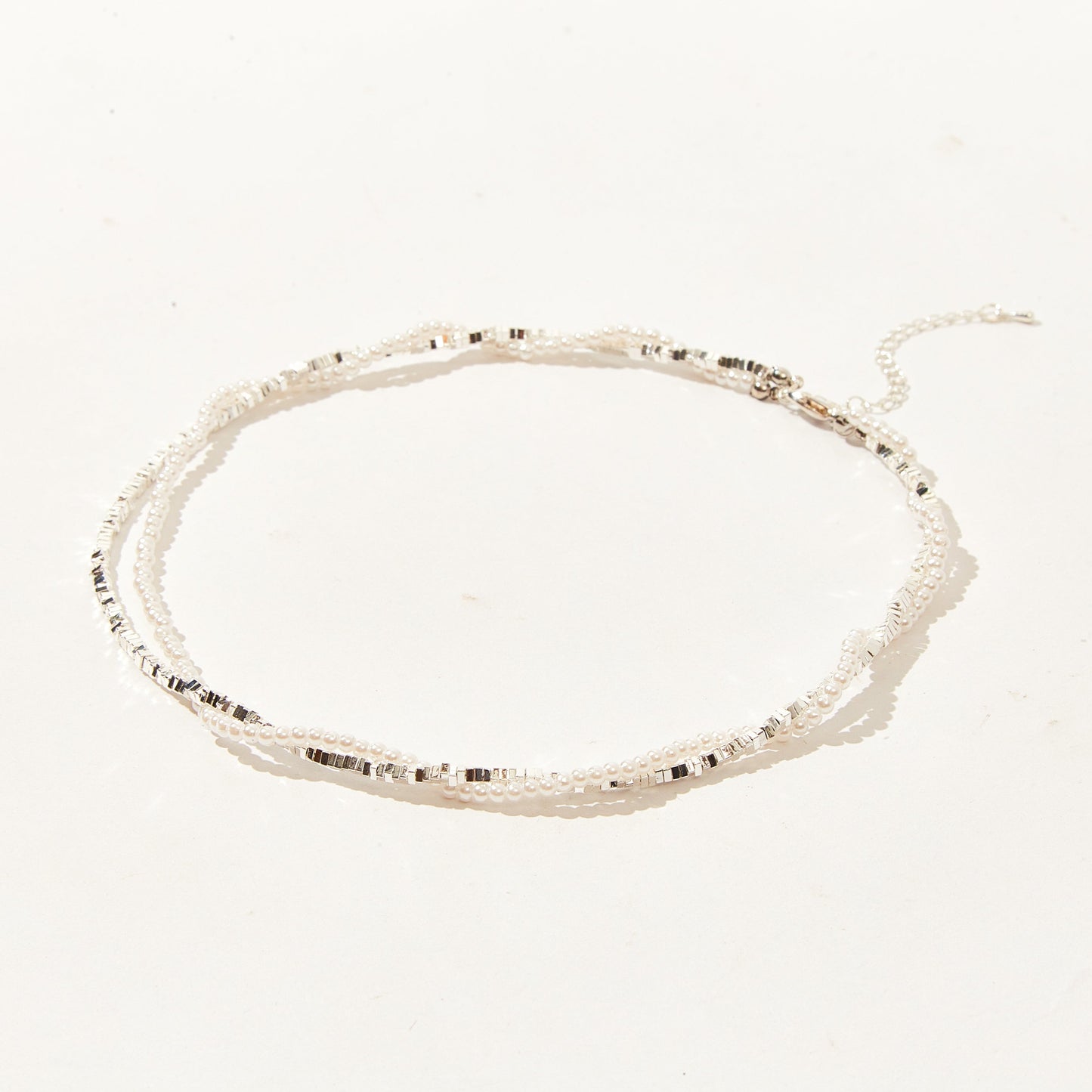 Two-strand twist pearl choker necklace