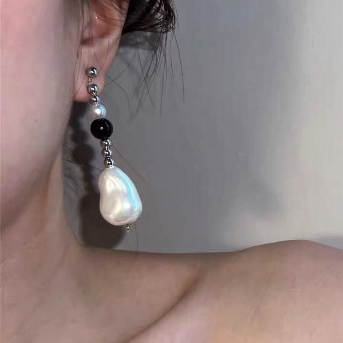 Onyx and baroque pearl statement earring