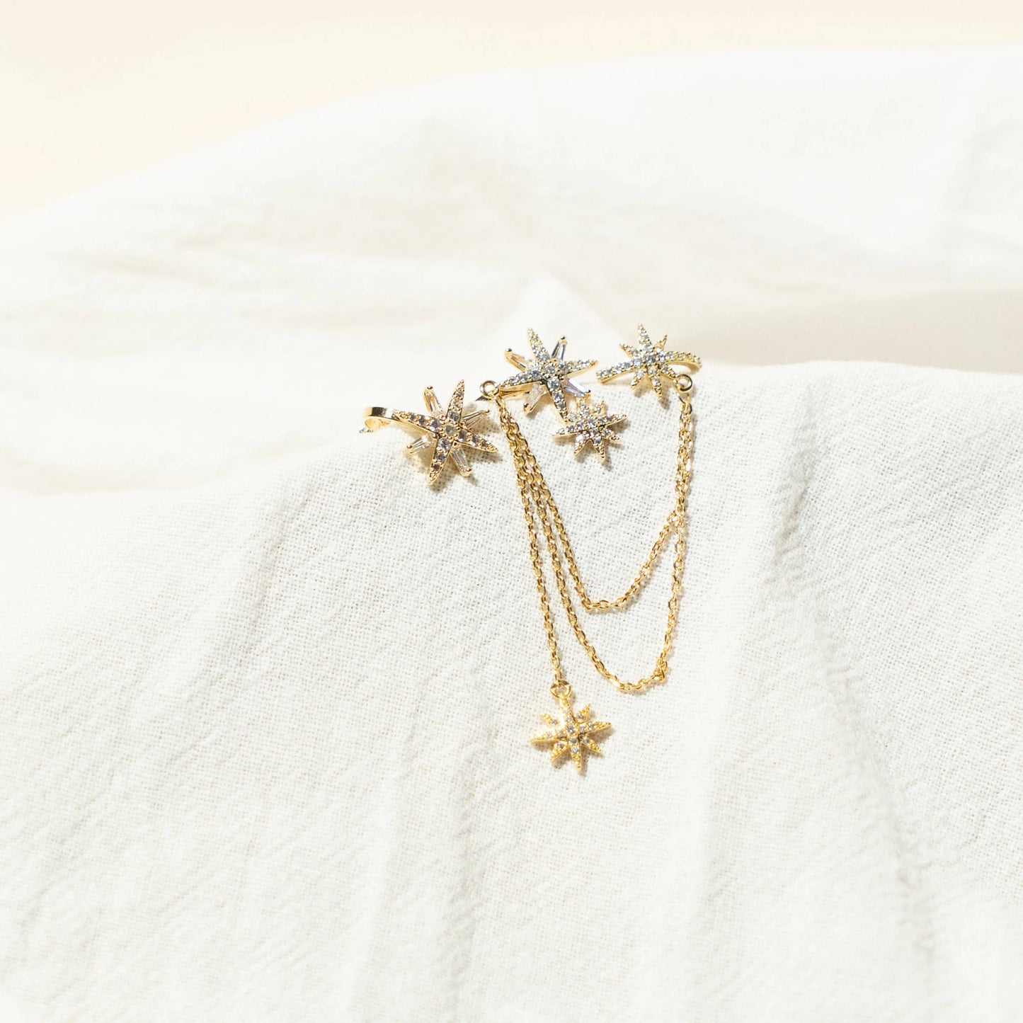 Asymmetrical Gold Star Earrings