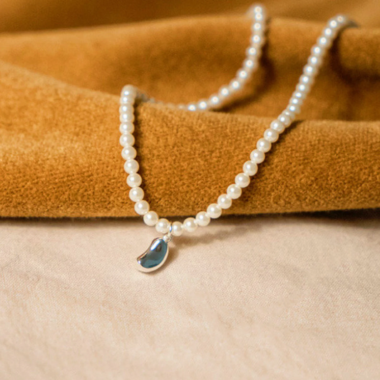 Pearl beaded necklace with teardrop pendant